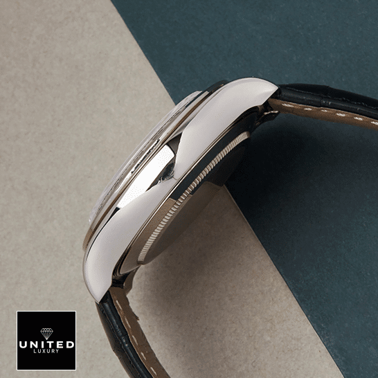 Rolex Daytona 116519 "White Roman Dial" First-Class Clone rolex daytona116519 replica leftside Rolex Daytona 116519 Stainless Steel Case Replica on the table