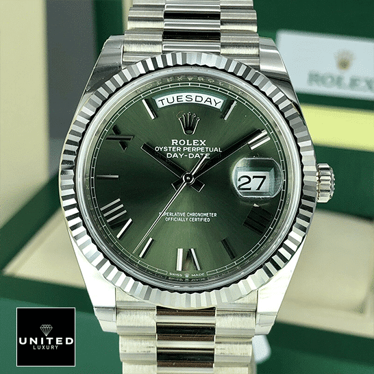 Rolex Day-Date 228239-0033 "Green Dial" Ultra Fine Replica rolex day date 228239 stainless steel green dial Rolex Day-Date Olive Green 228239 Replica Rolex Box in front of